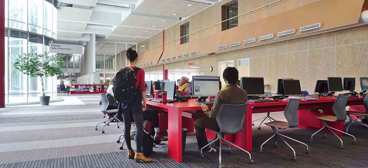 JLL employees working in open office space