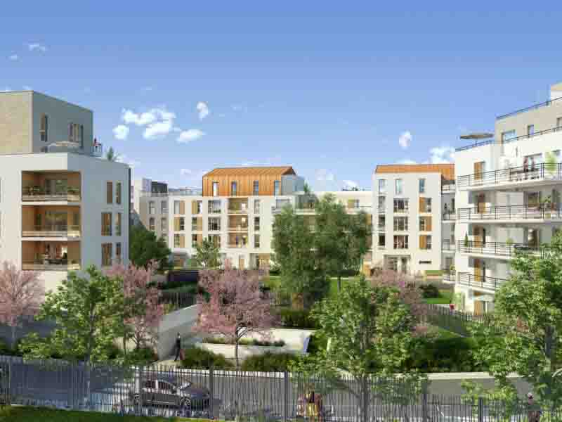 Residential building flats covered with greenery and security fence