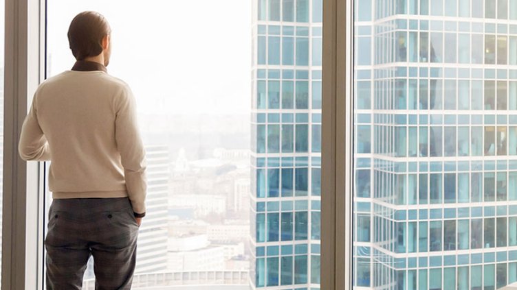 Men standing in front of the window