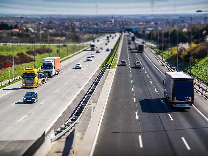 Multiple vehicles moving on road